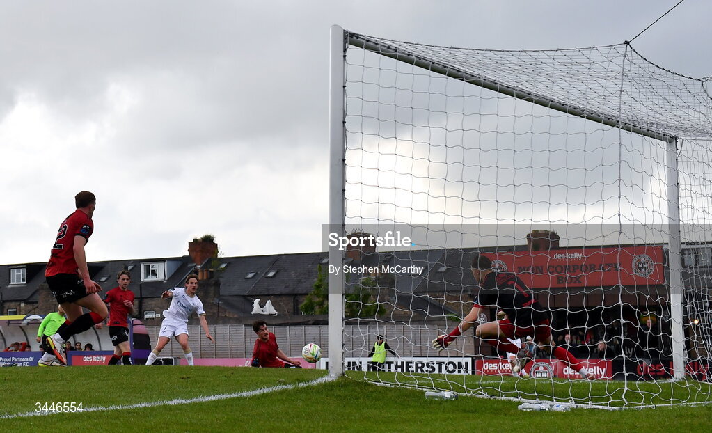 4 May 2026; Harry Wood of Shelbourne scores his side's second goal past Bohemians goalkeeper Kacper Chorazka during the SSE Airtricity Men's Premier Division match between Bohemians and Shelbourne at Dalymount Park in Dublin. Photo by Stephen McCarthy/Sportsfile