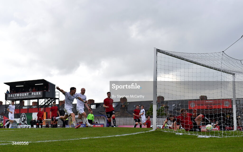 4 May 2026; Harry Wood of Shelbourne scores his side's second goal past Bohemians goalkeeper Kacper Chorazka during the SSE Airtricity Men's Premier Division match between Bohemians and Shelbourne at Dalymount Park in Dublin. Photo by Stephen McCarthy/Sportsfile