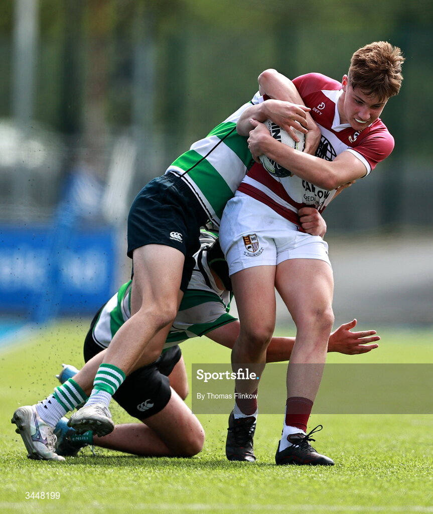 4 May 2026; Liam Nolan of Tullow RFC in action against Flynn Clayton, front, and Ollie Paquin of Naas RFC during the U15 McAuley Cup match between Naas RFC and Tullow RFC during the Leinster Rugby Youth Boys Cup Finals at Energia Park in Dublin. Photo by Thomas Flinkow/Sportsfile