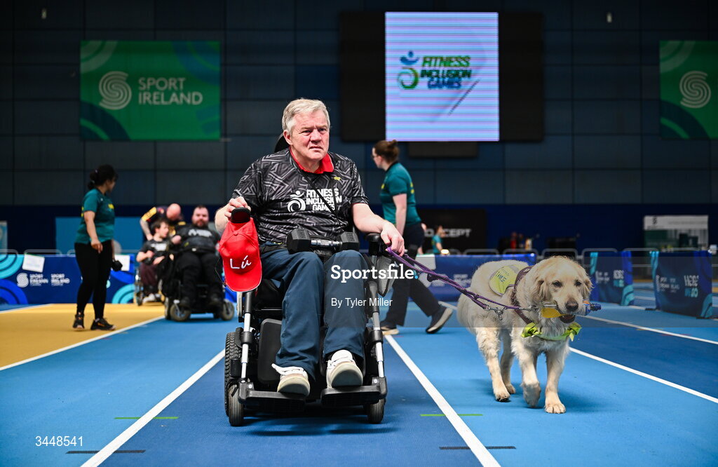 7 May 2026; More than a competition. Confidence, community and breaking down barriers. IWA’s Second Annual Fitness Inclusion Games brought athletes together to celebrate progress, resilience and the power of inclusion. Pictured during the IWA’s Second Annual Fitness Inclusion Games at the National Indoor Arena at the Sport Ireland Campus, Dublin is John Morgan and his assistance dog Jamie. Photo by Tyler Miller/Sportsfile
