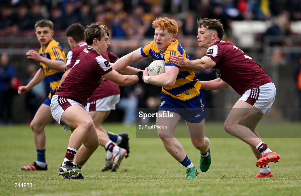 8 May 2026; Jayden Concannon of Roscommon is tackled by Evan McDonagh and Eoin Gannon of Galway during the Electric Ireland Connacht GAA Minor Football Championship final match between Galway and Roscommon at Tuam Stadium in Galway. Photo by Paul Phelan/Sportsfile