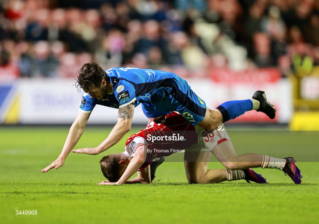 8 May 2026; Simon Power of St Patrick's Athletic in action against Kevin Long of Waterford during the SSE Airtricity Men’s Premier Division match between St Patrick's Athletic and Waterford at Richmond Park in Dublin. Photo by Thomas Flinkow/Sportsfile