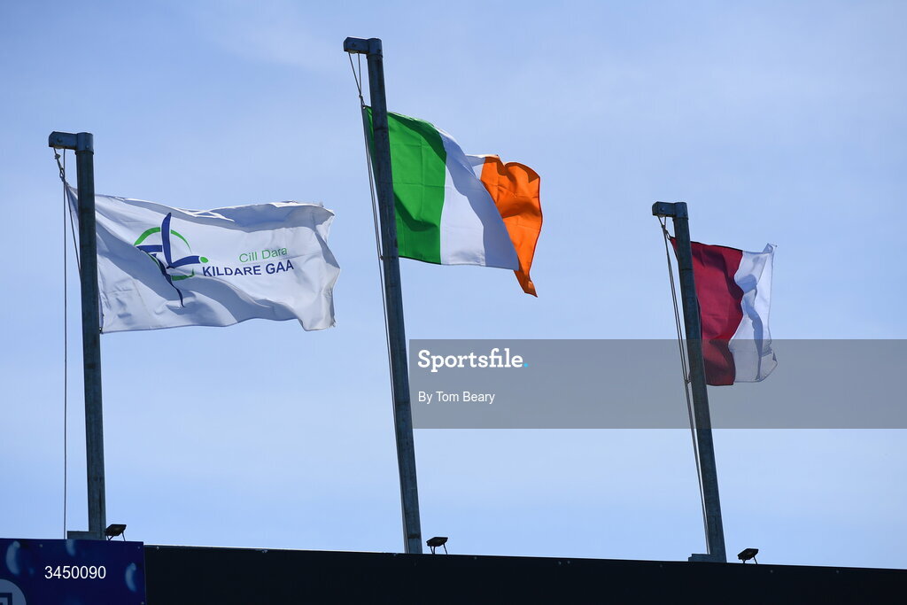 9 May 2026; The Irish Tricolour along with the flags of Kildare, left, and Galway flying inside the ground before the Leinster GAA Senior Hurling Championship round 3 match between Kildare and Galway at Cedral St Conleth's Park in Newbridge, Kildare. Photo by Tom Beary/Sportsfile