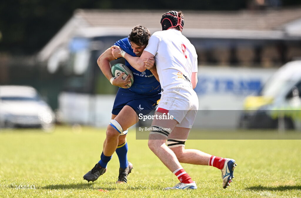 9 May 2026; Greg Culhane of Leinster is tackled by Michael Rooney of Ulster during the IRFU Men's Junior Interprovincial Round 3 match between Ulster and Leinster at Lisburn RFC in Lisburn, Antrim. Photo by Ben McShane/Sportsfile