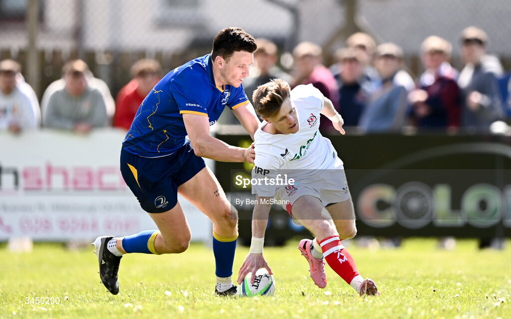 9 May 2026; James Ferguson of Ulster scores a try despite the tackle of Darragh White of Leinster during the IRFU Men's Junior Interprovincial Round 3 match between Ulster and Leinster at Lisburn RFC in Lisburn, Antrim. Photo by Ben McShane/Sportsfile