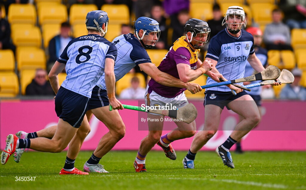 9 May 2026; Kevin Foley of Wexford in action against Dublin players, from left, Brian Hayes, Eoghan O'Donnell and Conor Donohoe during the Leinster GAA Senior Hurling Championship round 3 match between Wexford and Dublin at Chadwicks Wexford Park in Wexford. Photo by Piaras Ó Mídheach/Sportsfile
