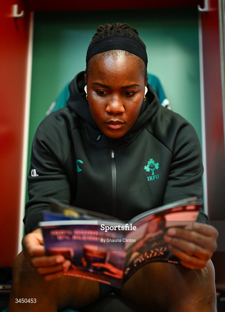 9 May 2026; Linda Djougang of Ireland inspects the match programme in the dressing room before the Women's 6 Nations Rugby Championship match between Ireland and Wales at Affidea Stadium in Belfast. Photo by Shauna Clinton/Sportsfile