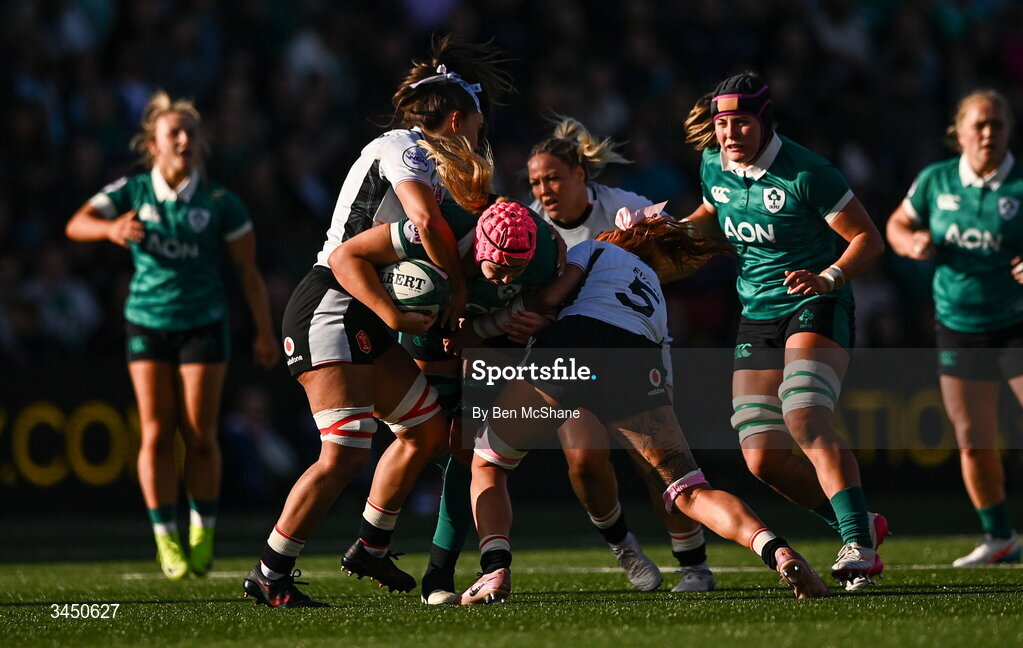 9 May 2026; Dorothy Wall of Ireland is tackled by Bryonie King, left, and Georgia Evans of Wales during the Women's 6 Nations Rugby Championship match between Ireland and Wales at Affidea Stadium in Belfast. Photo by Ben McShane/Sportsfile
