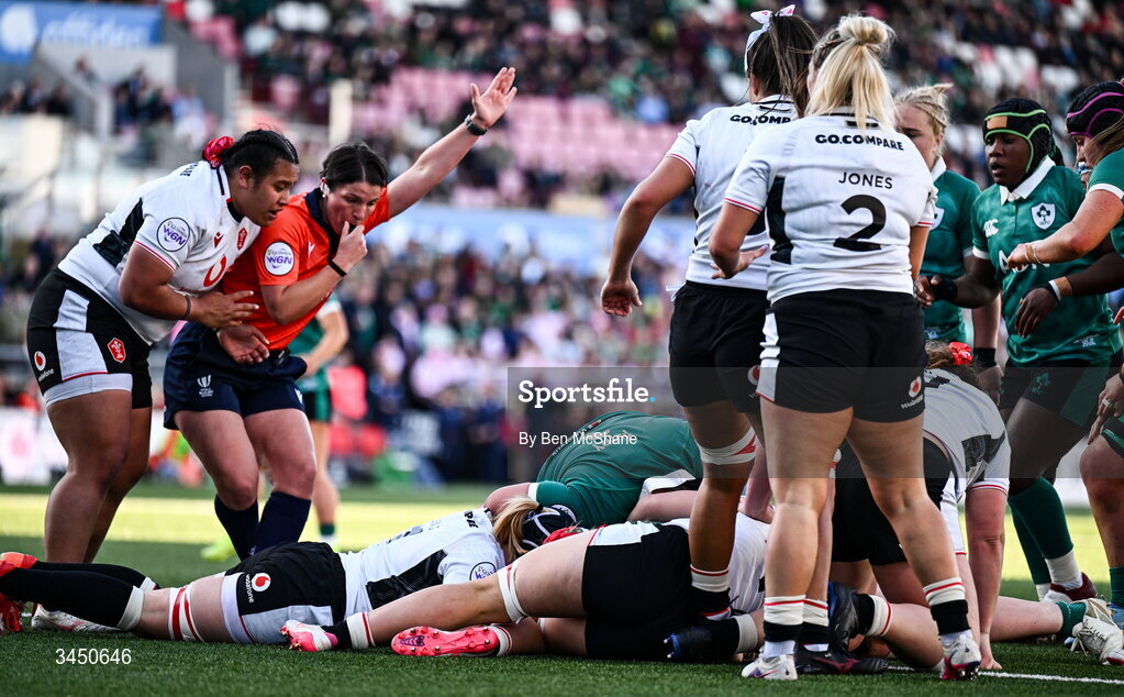 9 May 2026; Referee Aurelie Groizeleau signals as Aoife Wafer of Ireland, hidden, scores her side's first try during the Women's 6 Nations Rugby Championship match between Ireland and Wales at Affidea Stadium in Belfast. Photo by Ben McShane/Sportsfile