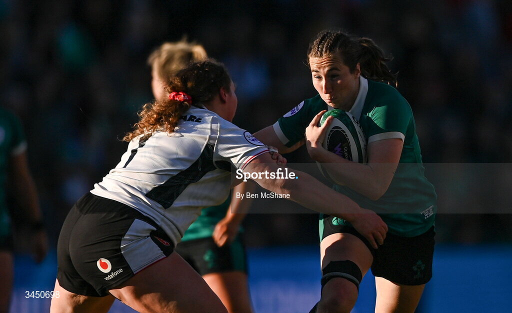 9 May 2026; Eve Higgins of Ireland is tackled by Gwenllian Pyrs of Wales during the Women's 6 Nations Rugby Championship match between Ireland and Wales at Affidea Stadium in Belfast. Photo by Ben McShane/Sportsfile