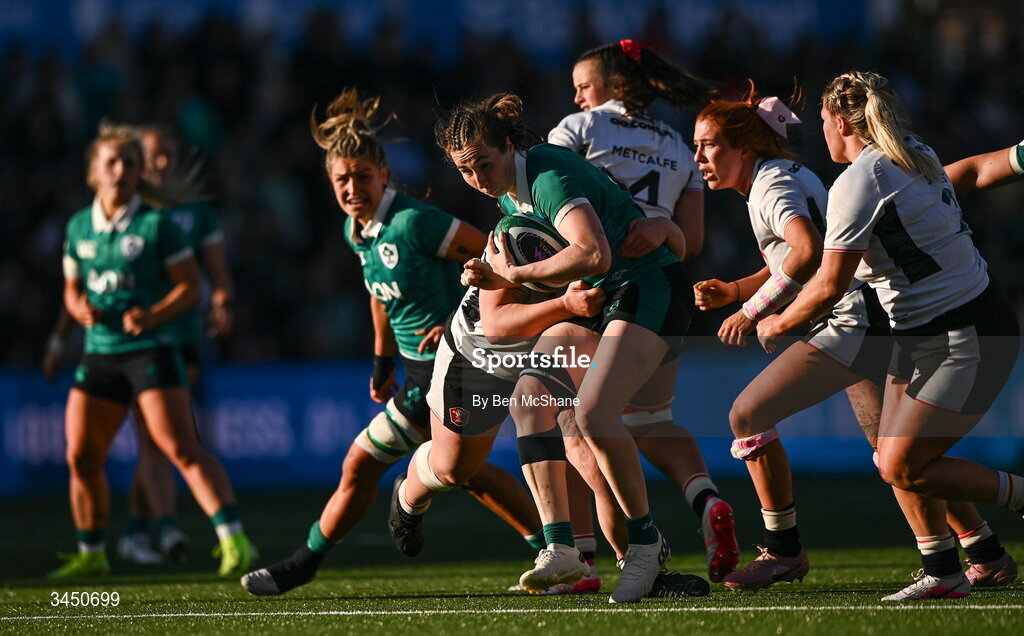 9 May 2026; Eve Higgins of Ireland is tackled by Gwenllian Pyrs of Wales during the Women's 6 Nations Rugby Championship match between Ireland and Wales at Affidea Stadium in Belfast. Photo by Ben McShane/Sportsfile