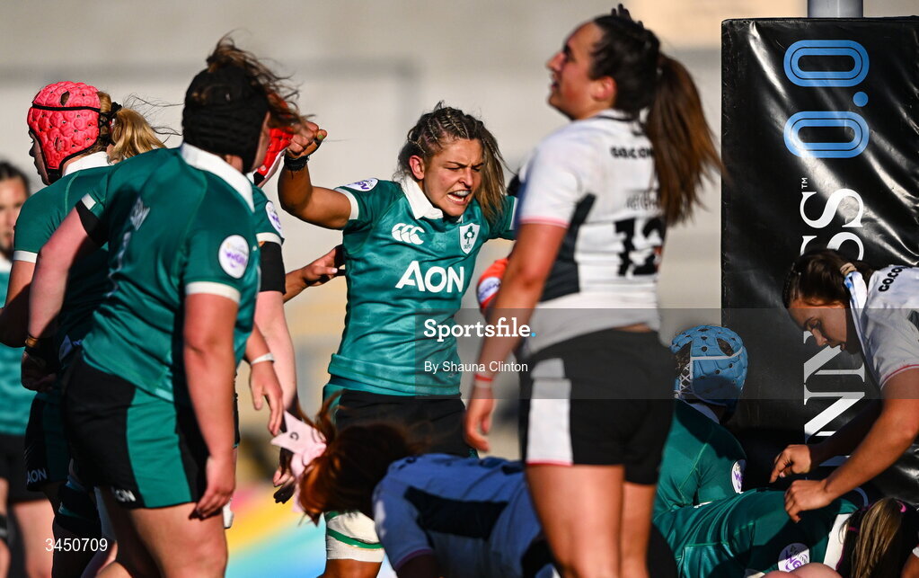 9 May 2026; Erin King of Ireland, centre, celebrates her side's third try, scored by team-mate Brittany Hogan, hidden, during the Women's 6 Nations Rugby Championship match between Ireland and Wales at Affidea Stadium in Belfast. Photo by Shauna Clinton/Sportsfile
