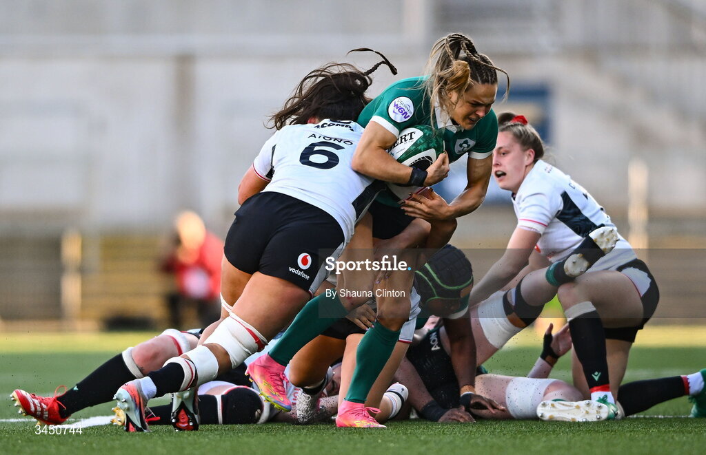9 May 2026; Béibhinn Parsons of Ireland is tackled by Jorja Aiono of Wales during the Women's 6 Nations Rugby Championship match between Ireland and Wales at Affidea Stadium in Belfast. Photo by Shauna Clinton/Sportsfile