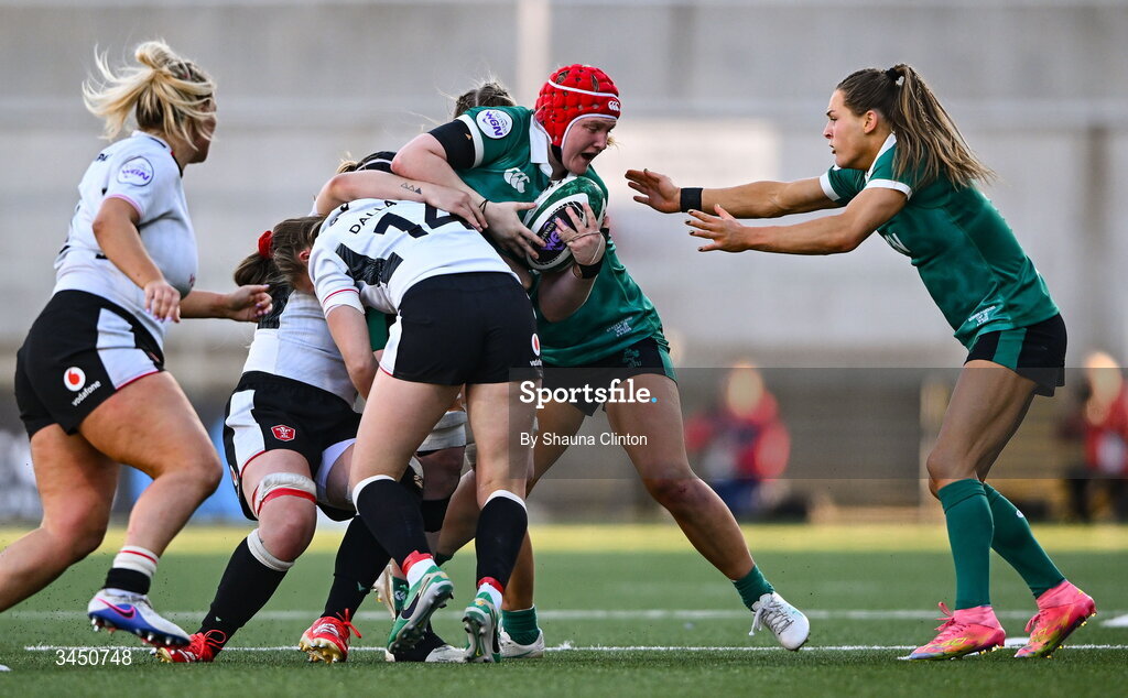 9 May 2026; Aoife Wafer of Ireland is tackled by Hannah Dallavalle of Wales during the Women's 6 Nations Rugby Championship match between Ireland and Wales at Affidea Stadium in Belfast. Photo by Shauna Clinton/Sportsfile