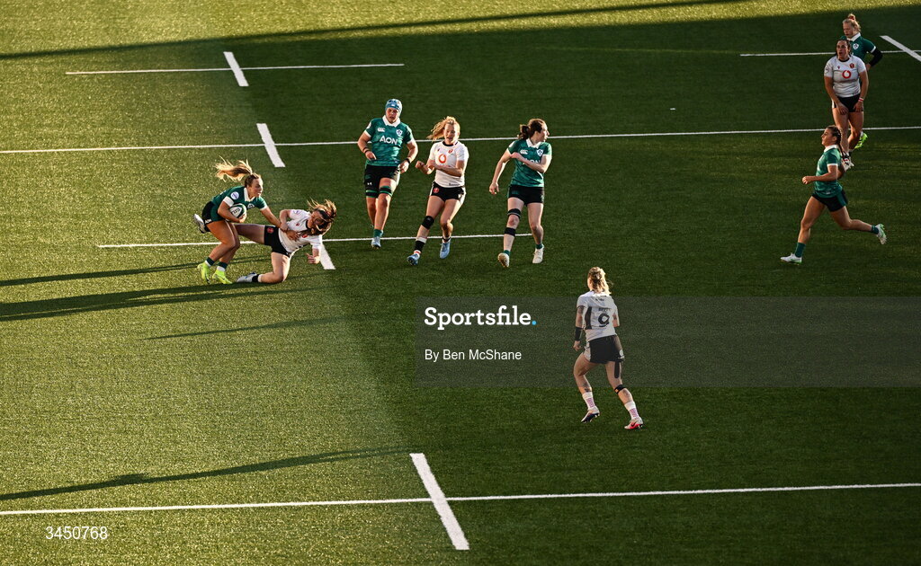 9 May 2026; Aoife Dalton of Ireland is tackled by Kayleigh Powell of Wales during the Women's 6 Nations Rugby Championship match between Ireland and Wales at Affidea Stadium in Belfast. Photo by Ben McShane/Sportsfile