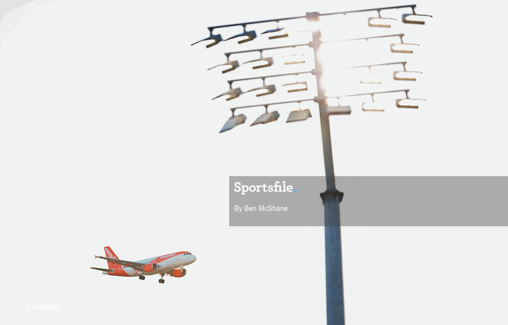9 May 2026; An EasyJet flight, bound for Belfast from London, is seen past a floodlight during the Women's 6 Nations Rugby Championship match between Ireland and Wales at Affidea Stadium in Belfast. Photo by Ben McShane/Sportsfile