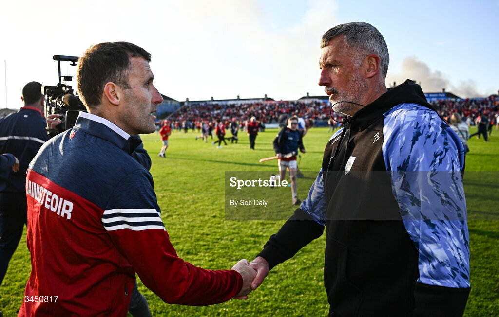 9 May 2026; Cork manager Ben O'Connor, left, and Waterford manager Peter Queally shake hands after the Munster GAA Senior Hurling Championship Round 3 match between Waterford and Cork at Azzurri Walsh Park in Waterford. Photo by Seb Daly/Sportsfile