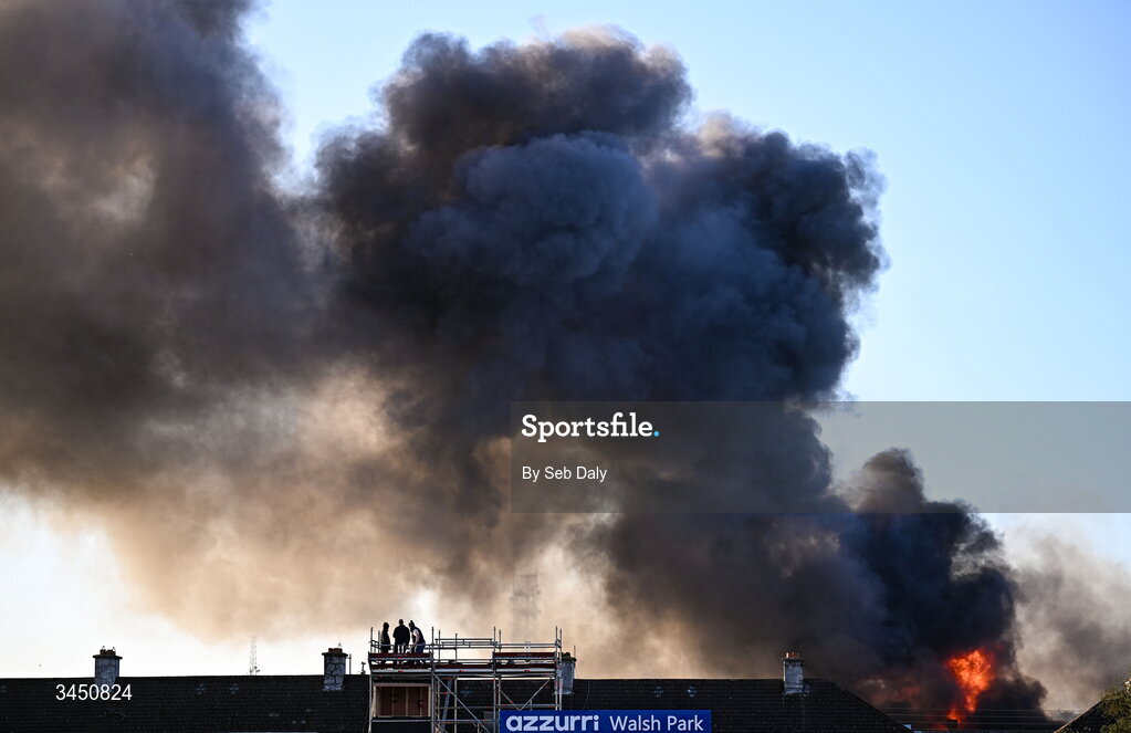 9 May 2026; Smoke rises over the stadium from a nearby fire after the Munster GAA Senior Hurling Championship Round 3 match between Waterford and Cork at Azzurri Walsh Park in Waterford. Photo by Seb Daly/Sportsfile