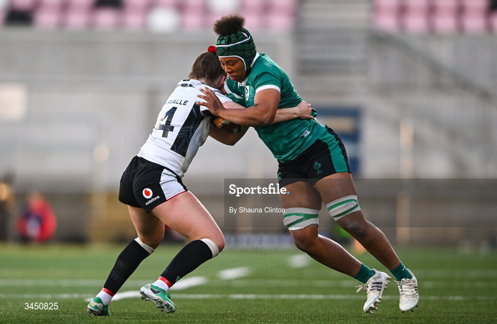 9 May 2026; Grace Moore of Ireland in action against Hannah Dallavalle of Wales during the Women's 6 Nations Rugby Championship match between Ireland and Wales at Affidea Stadium in Belfast. Photo by Shauna Clinton/Sportsfile