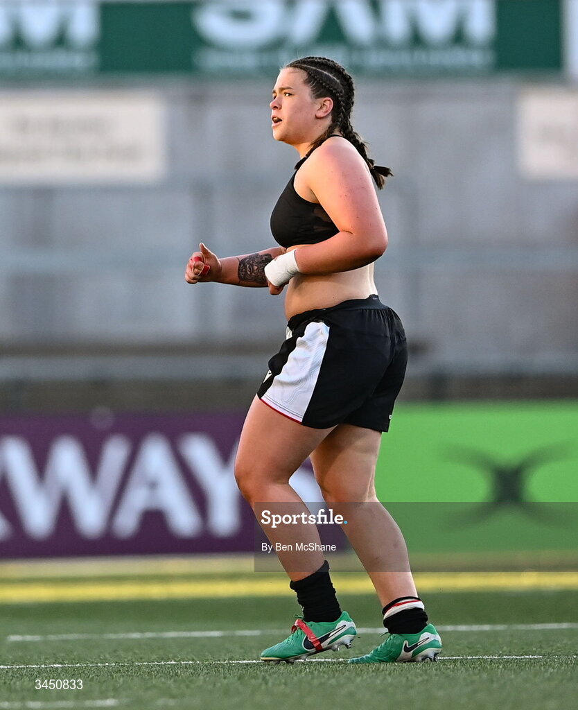 9 May 2026; Maisie Davies of Wales, right, continues play without a shirt during the Women's 6 Nations Rugby Championship match between Ireland and Wales at Affidea Stadium in Belfast. Photo by Ben McShane/Sportsfile