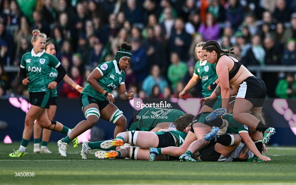 9 May 2026; Maisie Davies of Wales, right, continues play without a shirt during the Women's 6 Nations Rugby Championship match between Ireland and Wales at Affidea Stadium in Belfast. Photo by Ben McShane/Sportsfile
