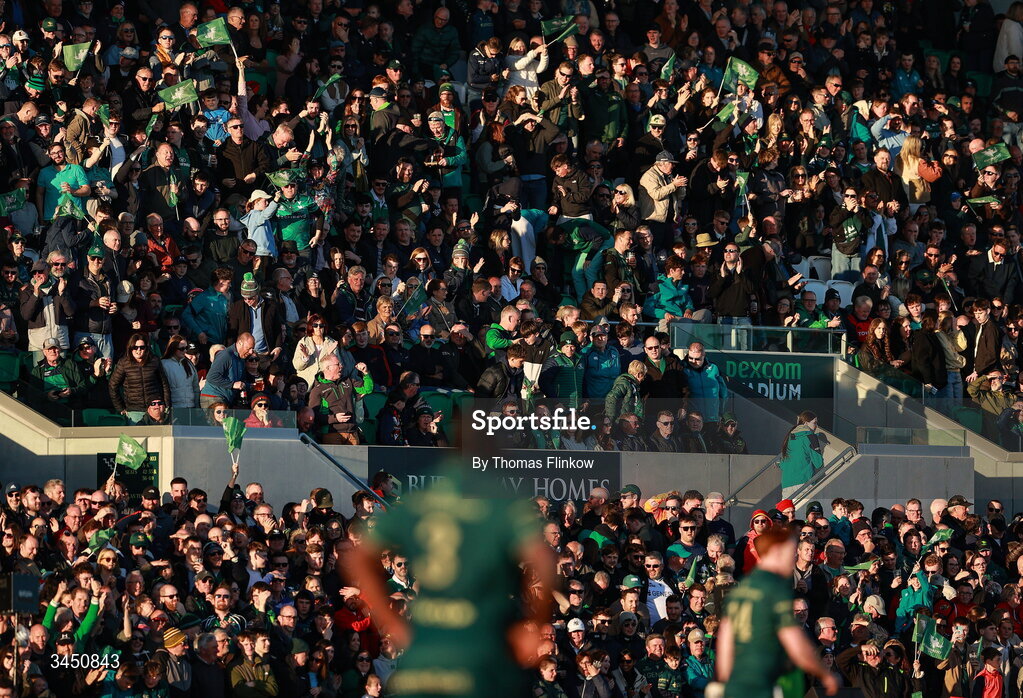 9 May 2026; Connacht supporters celebrate their side's third try during the United Rugby Championship match between Connacht and Munster at Dexcom Stadium in Galway. Photo by Thomas Flinkow/Sportsfile