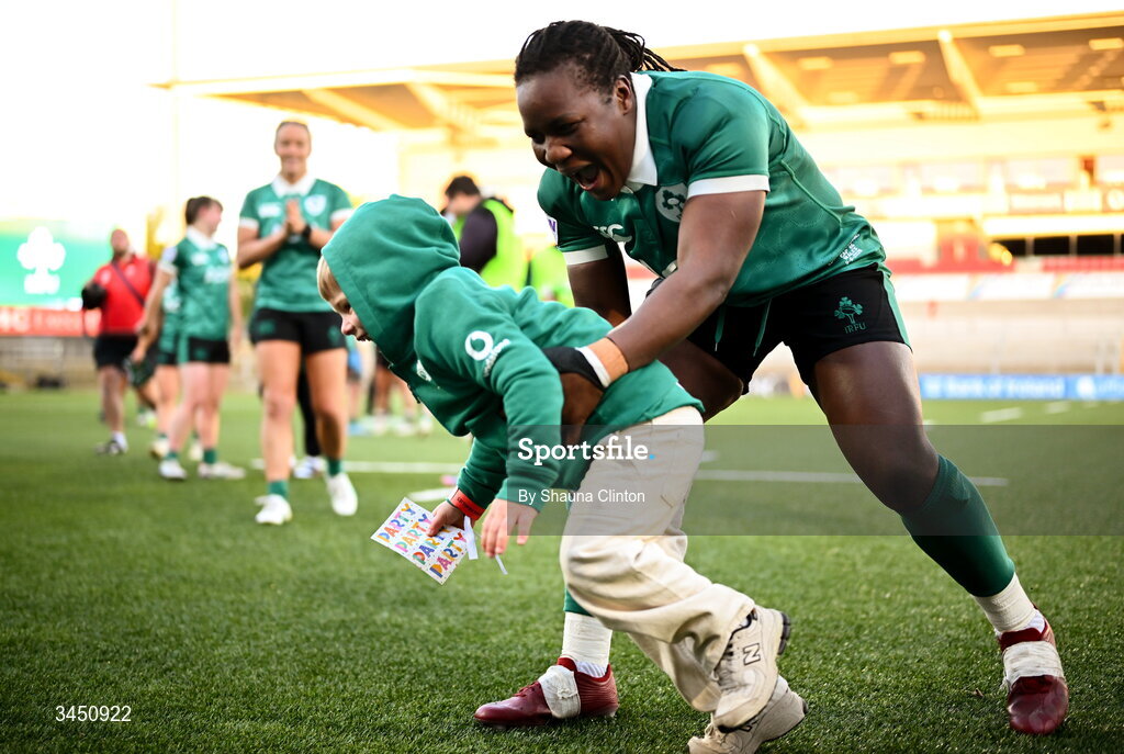 9 May 2026; Linda Djougang of Ireland with Bert, son of team-mate Ellena Perry, not pictured, after the Women's 6 Nations Rugby Championship match between Ireland and Wales at Affidea Stadium in Belfast. Photo by Shauna Clinton/Sportsfile