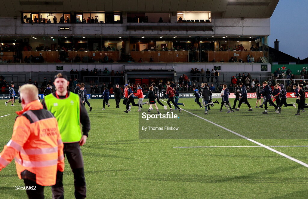 9 May 2026; Supporters on the pitch after the United Rugby Championship match between Connacht and Munster at Dexcom Stadium in Galway. Photo by Thomas Flinkow/Sportsfile