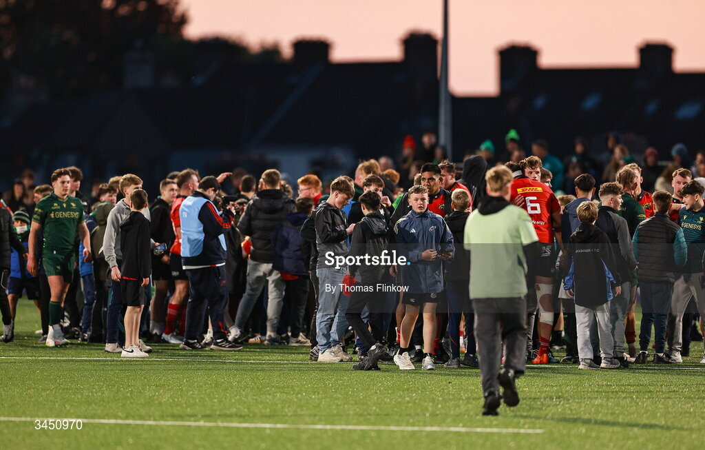 9 May 2026; Players and supporters on the pitch after the United Rugby Championship match between Connacht and Munster at Dexcom Stadium in Galway. Photo by Thomas Flinkow/Sportsfile
