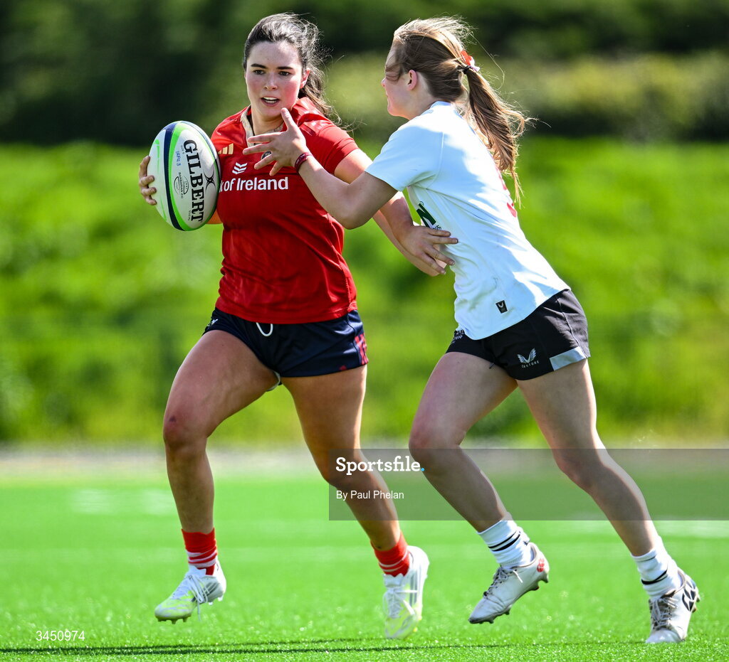 9 May 2026; Cate Foley of Munster 1 in action against Brooke Watt of Ulster 2 during the IRFU U18 Girls 7s Interprovincial Series match between Munster 1 and Ulster 2 at Mullingar RFC in Westmeath. Photo by Paul Phelan/Sportsfile