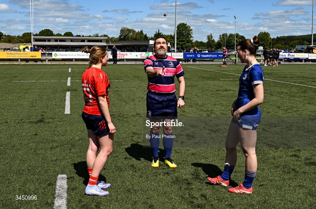 9 May 2026; Referee David Orde tosses the coin with Munster 1 captain Elsa Quirke and Leinster 1 captain Milita Valteryte before the IRFU U18 Girls 7s Interprovincial Series match between Munster 1 and Leinster 1 at Mullingar RFC in Westmeath. Photo by Paul Phelan/Sportsfile