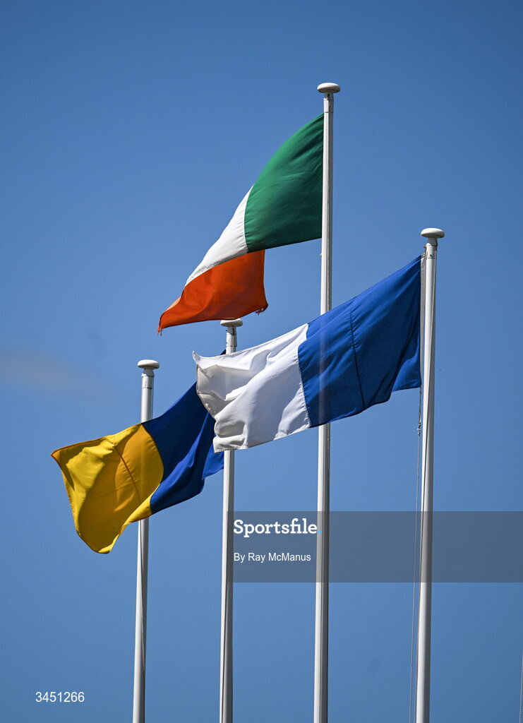 10 May 2026; The Irish Tricolour along with the flags of, from left, Wicklow and Laois flying inside the ground before the Táilteann Cup round 1 match between Laois and Wicklow at Laois Hire O'Moore Park in Portlaoise, Laois. Photo by Ray McManus/Sportsfile
