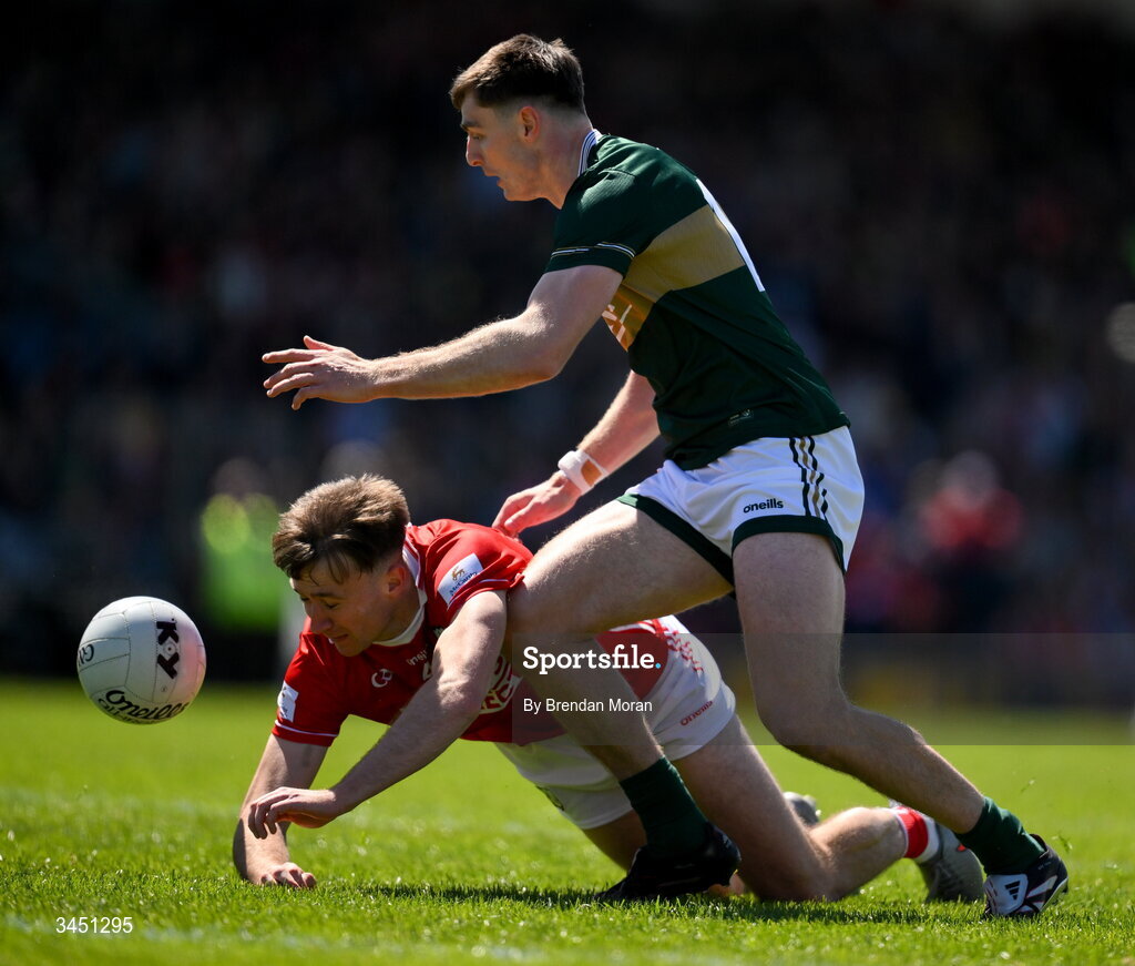 10 May 2026; Diarmuid O'Connor of Kerry in action against Seán Meehan of Cork during the Munster GAA Football Senior Championship final match between Kerry and Cork at Fitzgerald Stadium in Killarney, Kerry. Photo by Brendan Moran/Sportsfile