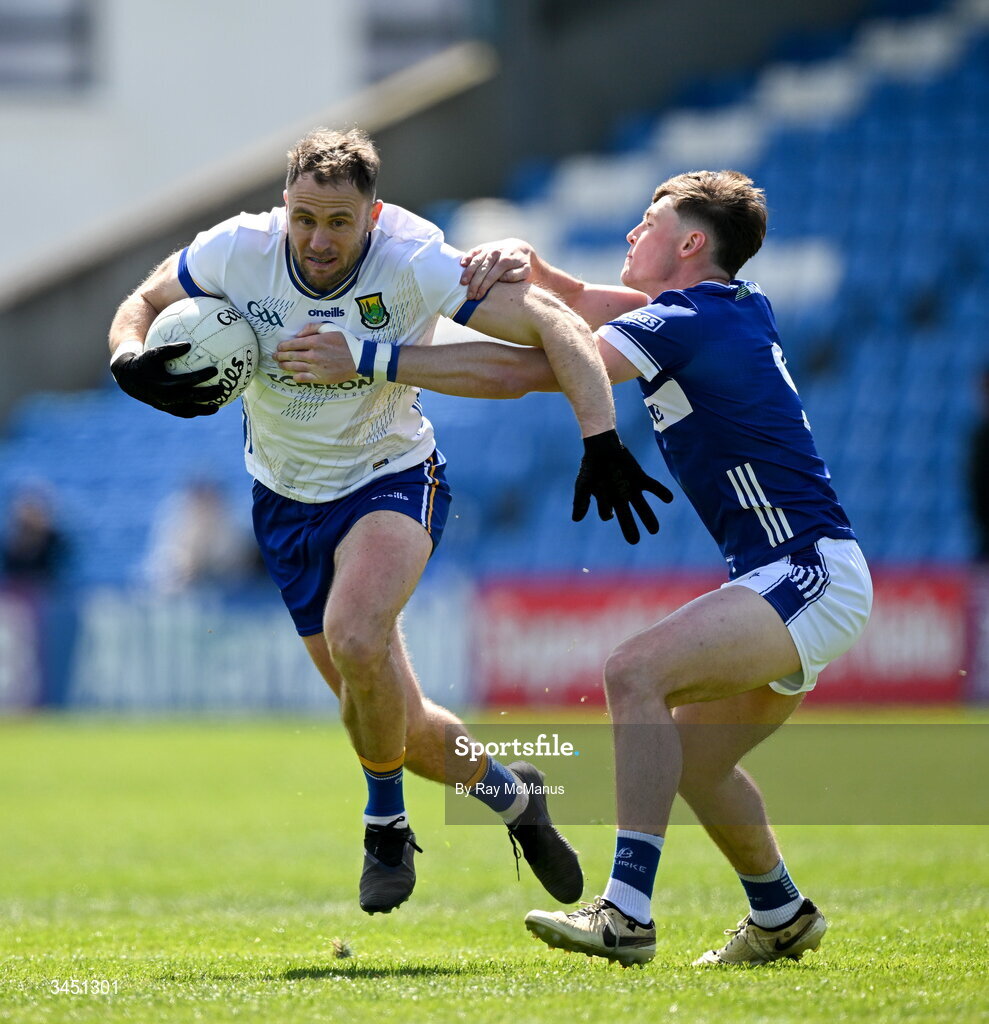 10 May 2026; Dean Healy of Wicklow is tackled by Conor Heffernan of Laois during the Táilteann Cup round 1 match between Laois and Wicklow at Laois Hire O'Moore Park in Portlaoise, Laois. Photo by Ray McManus/Sportsfile