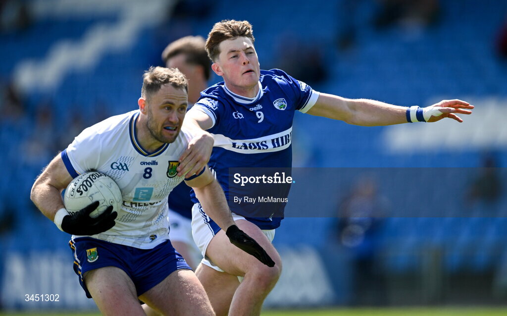 10 May 2026; Dean Healy of Wicklow is tackled by Conor Heffernan of Laois during the Táilteann Cup round 1 match between Laois and Wicklow at Laois Hire O'Moore Park in Portlaoise, Laois. Photo by Ray McManus/Sportsfile