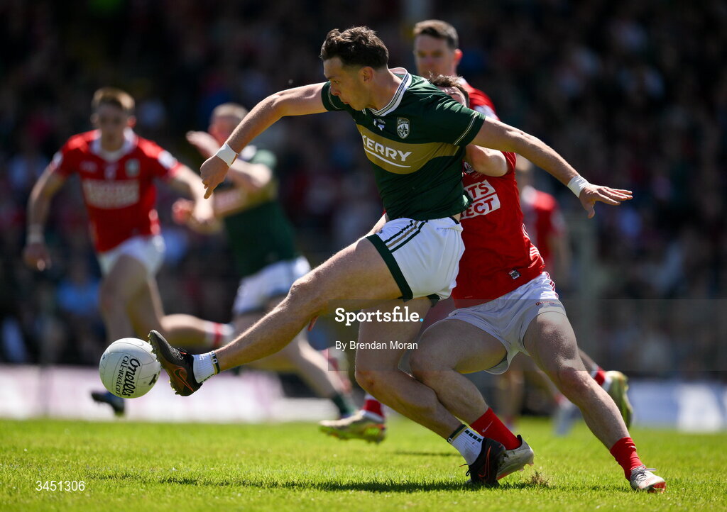 10 May 2026; David Clifford of Kerry has a shot on goal as he is tackled by Daniel O’Mahony of Cork during the Munster GAA Football Senior Championship final match between Kerry and Cork at Fitzgerald Stadium in Killarney, Kerry. Photo by Brendan Moran/Sportsfile