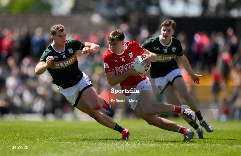 10 May 2026; Seán Meehan of Cork in action against Mark O'Shea and Keith Evans of Kerry during the Munster GAA Football Senior Championship final match between Kerry and Cork at Fitzgerald Stadium in Killarney, Kerry. Photo by Brendan Moran/Sportsfile