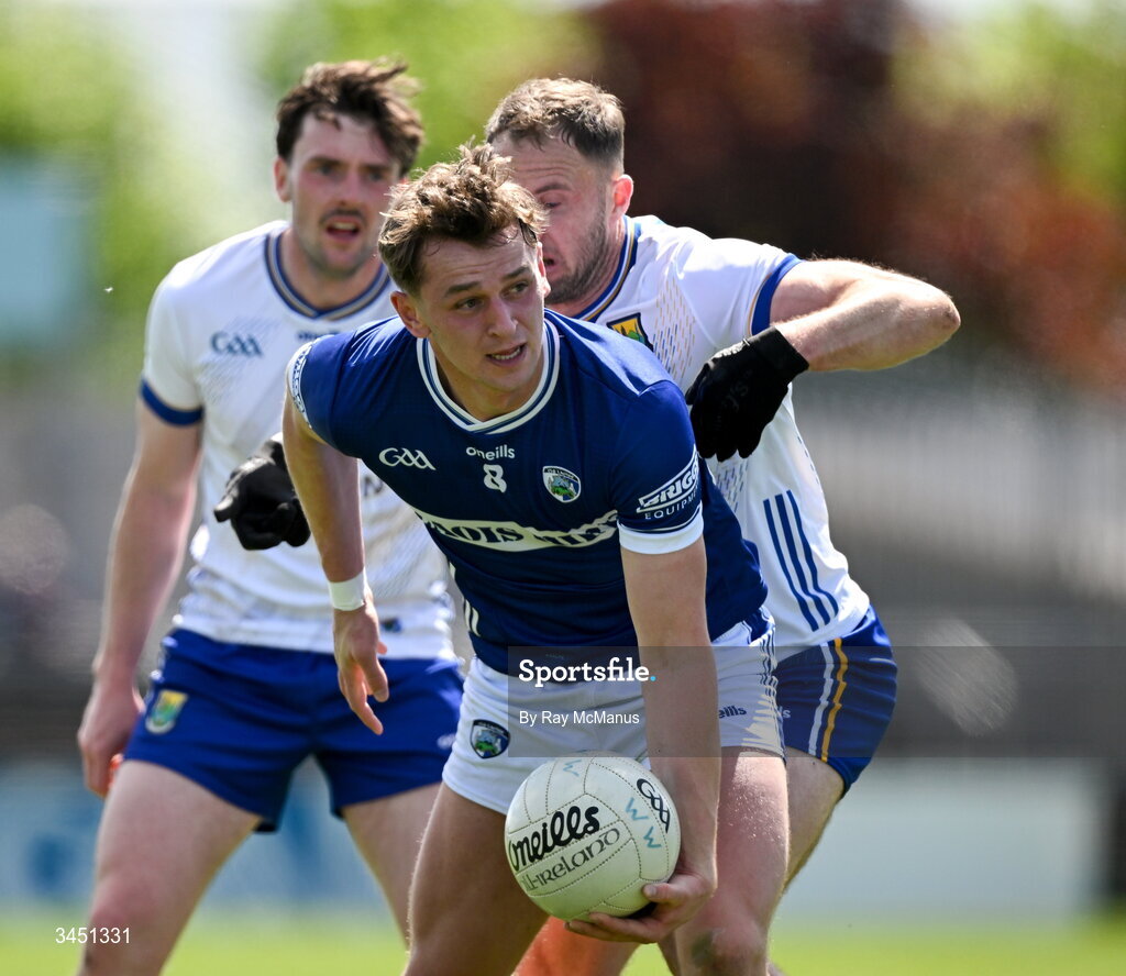 10 May 2026; Ciaran Burke of Laois is tackled by Dean Healy of Wicklow during the Táilteann Cup round 1 match between Laois and Wicklow at Laois Hire O'Moore Park in Portlaoise, Laois. Photo by Ray McManus/Sportsfile