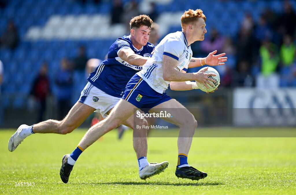 10 May 2026; Christopher O'Brien of Wicklow is tackled by Kevin Swayne of Laois during the Táilteann Cup round 1 match between Laois and Wicklow at Laois Hire O'Moore Park in Portlaoise, Laois. Photo by Ray McManus/Sportsfile