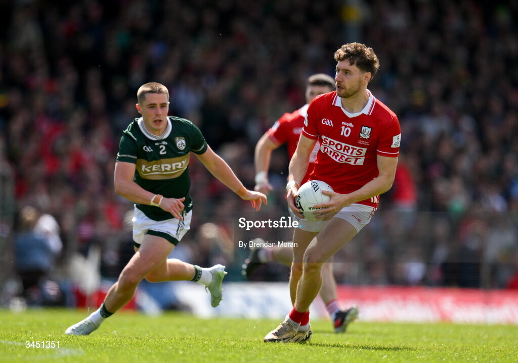 10 May 2026; Paul Walsh of Cork in action against Evan Looney of Kerry during the Munster GAA Football Senior Championship final match between Kerry and Cork at Fitzgerald Stadium in Killarney, Kerry. Photo by Brendan Moran/Sportsfile