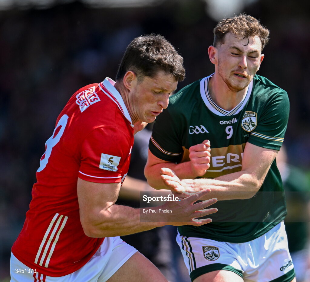 10 May 2026; Colm O’Callaghan of Cork and Seán O'Brien of Kerry collide during the Munster GAA Football Senior Championship final match between Kerry and Cork at Fitzgerald Stadium in Killarney, Kerry. Photo by Paul Phelan/Sportsfile