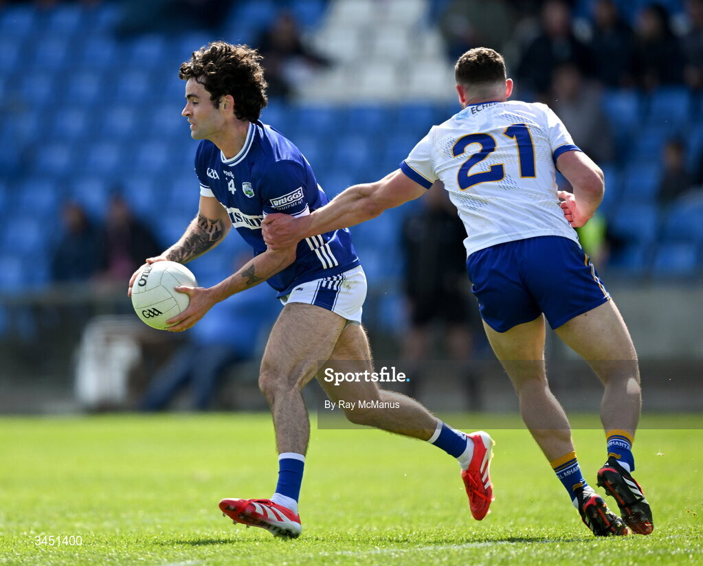 10 May 2026; Daragh Galvin of Laois is tackled by Conor Fee of Wicklow during the Táilteann Cup round 1 match between Laois and Wicklow at Laois Hire O'Moore Park in Portlaoise, Laois. Photo by Ray McManus/Sportsfile