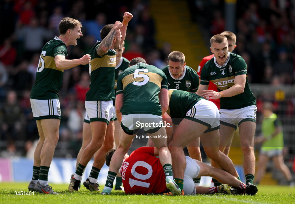 10 May 2026; Kerry players, including Micheál Burns and Dylan Casey, celebrat winning a free out against Paul Walsh of Cork during the Munster GAA Football Senior Championship final match between Kerry and Cork at Fitzgerald Stadium in Killarney, Kerry. Photo by Brendan Moran/Sportsfile