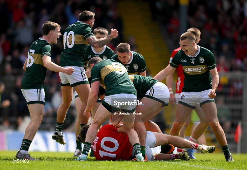 10 May 2026; Kerry players, including Micheál Burns and Dylan Casey, celebrat winning a free out against Paul Walsh of Cork during the Munster GAA Football Senior Championship final match between Kerry and Cork at Fitzgerald Stadium in Killarney, Kerry. Photo by Brendan Moran/Sportsfile