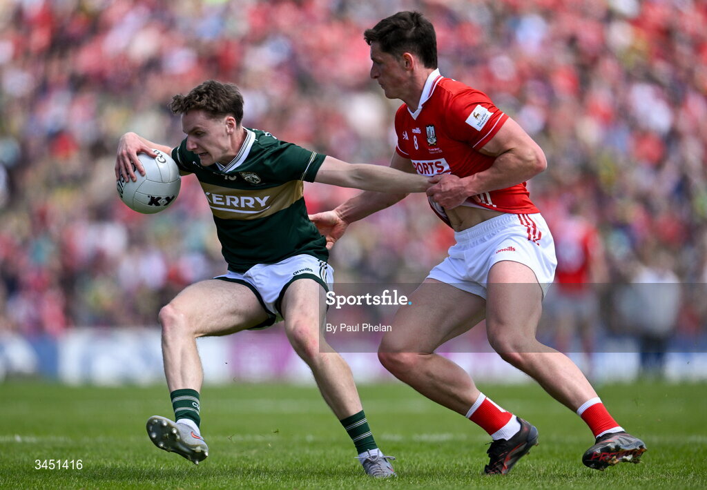 10 May 2026; Keith Evans of Kerry in action against Colm O’Callaghan of Cork during the Munster GAA Football Senior Championship final match between Kerry and Cork at Fitzgerald Stadium in Killarney, Kerry. Photo by Paul Phelan/Sportsfile