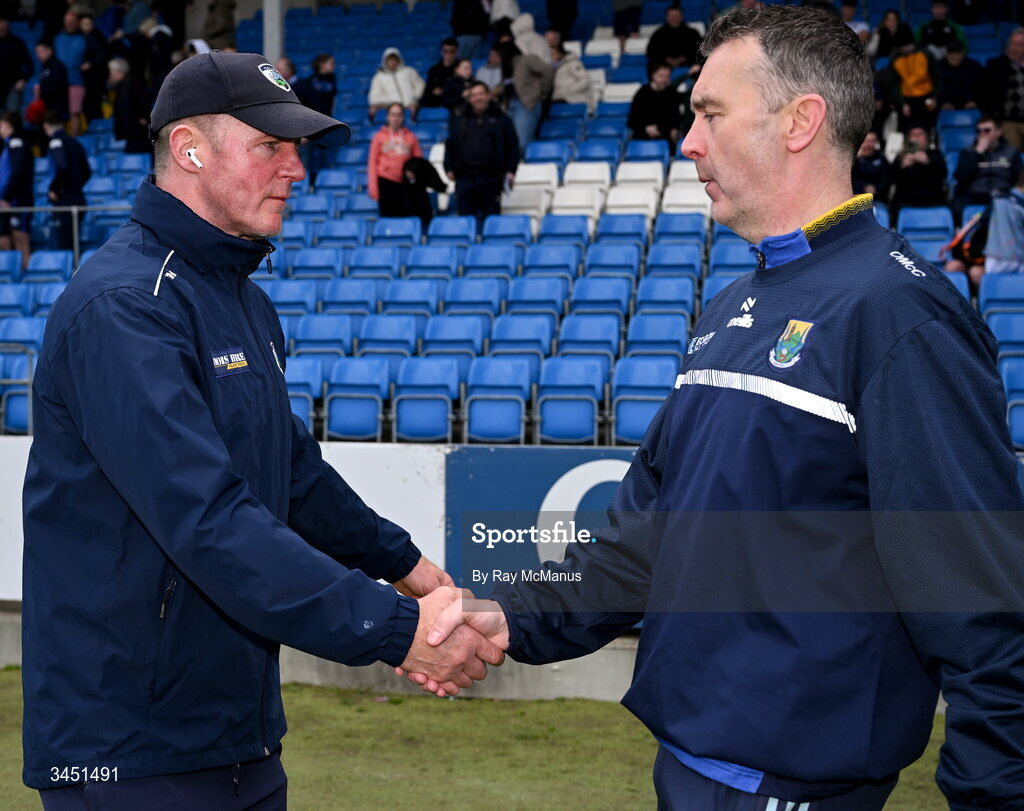 10 May 2026; The Laois manager Justin McNulty and Wicklow manager Oisín McConville, right, after the Táilteann Cup round 1 match between Laois and Wicklow at Laois Hire O'Moore Park in Portlaoise, Laois. Photo by Ray McManus/Sportsfile
