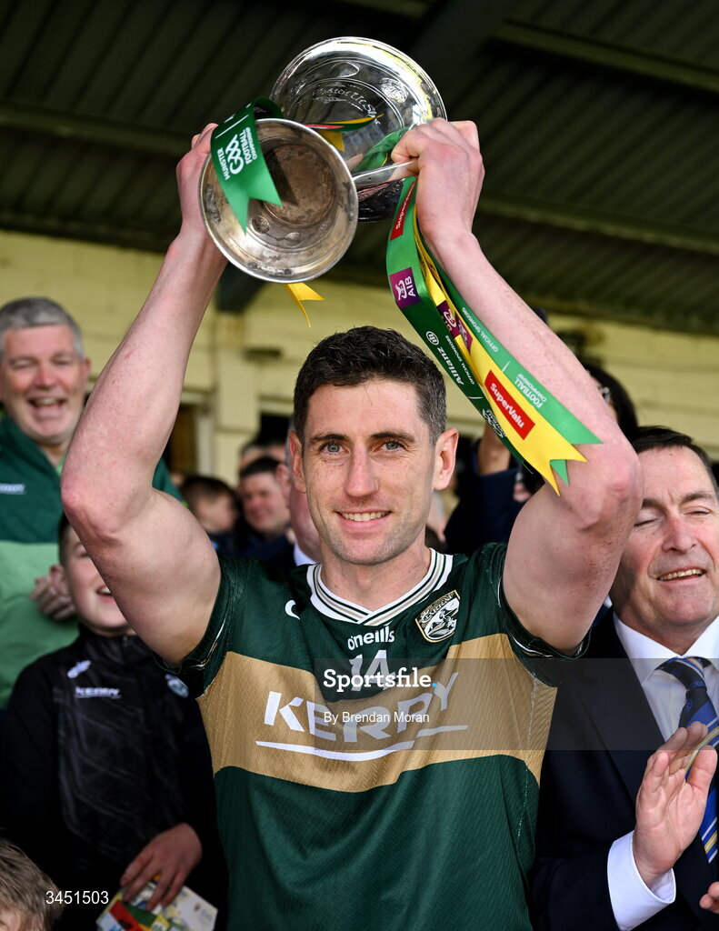 10 May 2026; Kerry captain Paul Geaney lifts the Corn Pháidí Uí Shé, named in honour of legendary Kerry footballer Páidí Ó Sé, after the Munster GAA Football Senior Championship final match between Kerry and Cork at Fitzgerald Stadium in Killarney, Kerry. Photo by Brendan Moran/Sportsfile