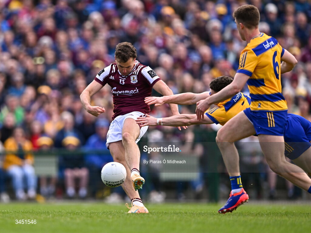 10 May 2026; Robert Finnerty of Galway scores his side's first goal, under pressure from Roscommon players Ronan Daly, 6, and Patrick Gavin during the Connacht GAA Football Senior Championship final match between Roscommon and Galway at King & Moffatt Dr Hyde Park in Roscommon. Photo by Piaras Ó Mídheach/Sportsfile