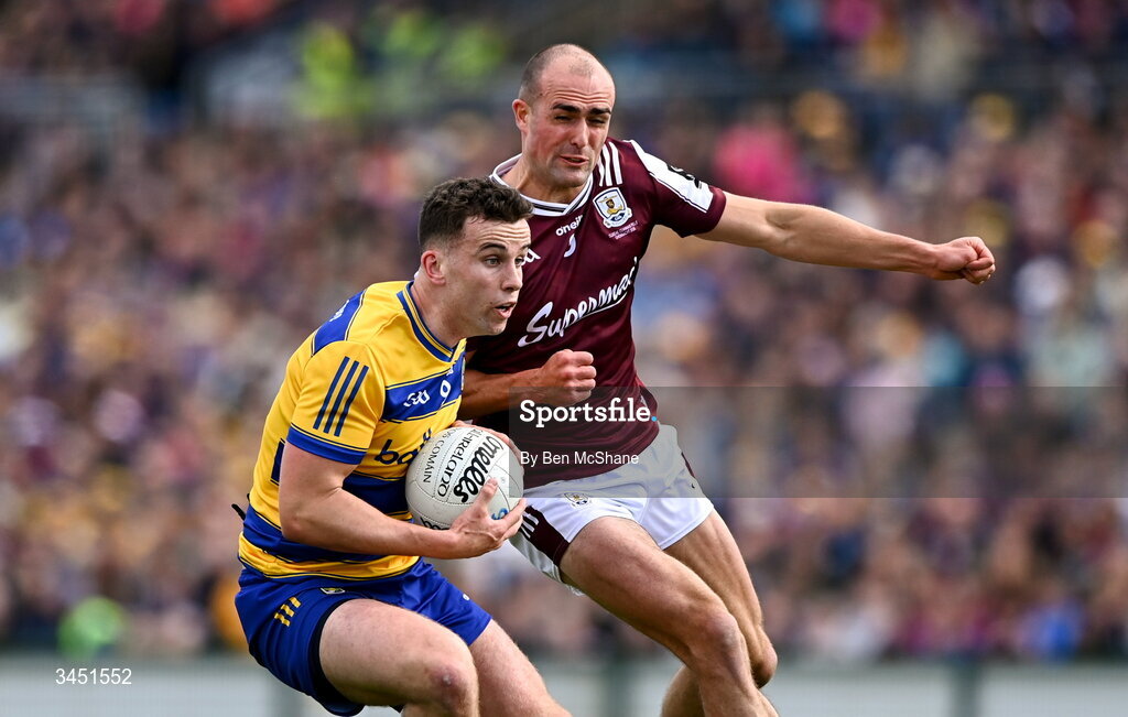 10 May 2026; Conor Ryan of Roscommon is tackled by John Maher of Galway during the Connacht GAA Football Senior Championship final match between Roscommon and Galway at King & Moffatt Dr Hyde Park in Roscommon. Photo by Ben McShane/Sportsfile