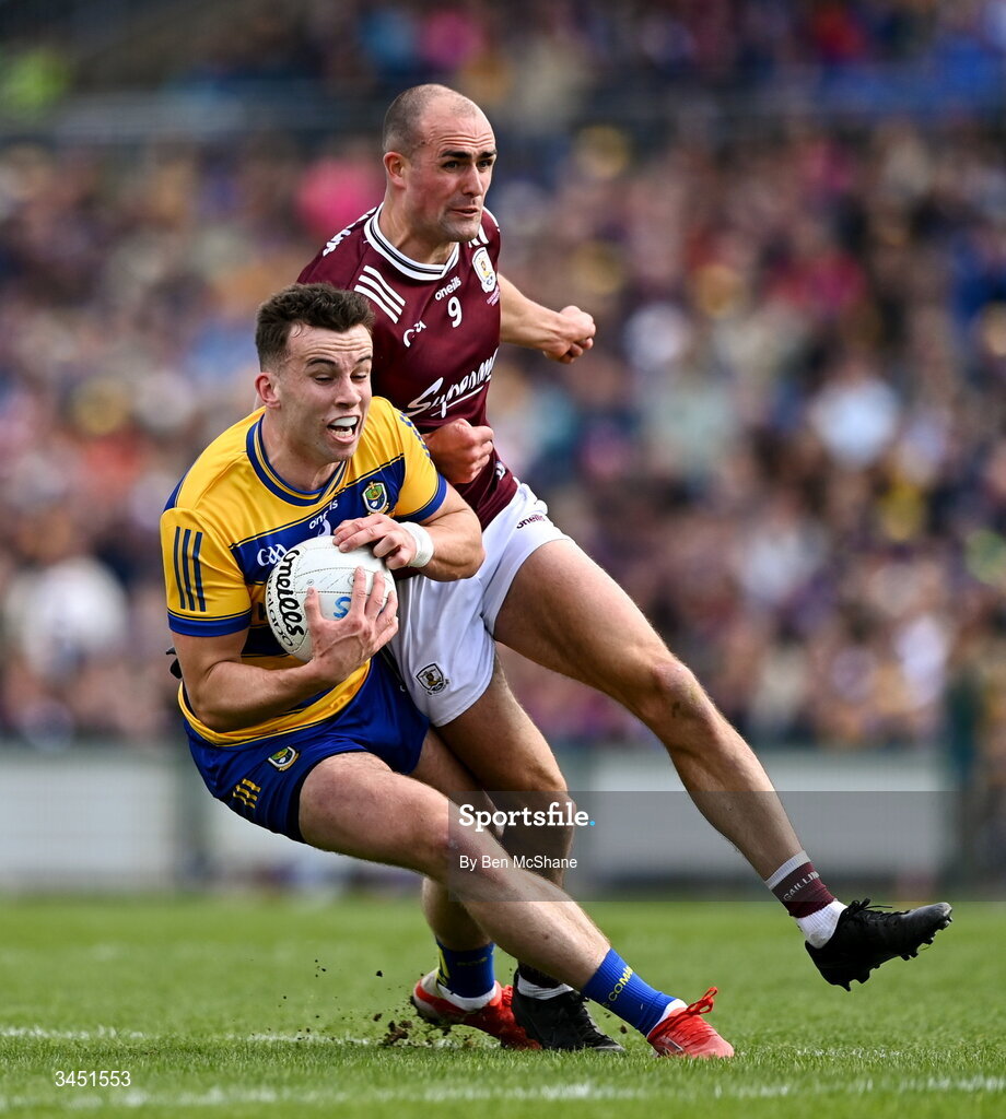 10 May 2026; Conor Ryan of Roscommon is tackled by John Maher of Galway during the Connacht GAA Football Senior Championship final match between Roscommon and Galway at King & Moffatt Dr Hyde Park in Roscommon. Photo by Ben McShane/Sportsfile